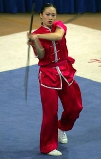 Woman practices Wushu (traditional Chinese meaning “martial art”). 