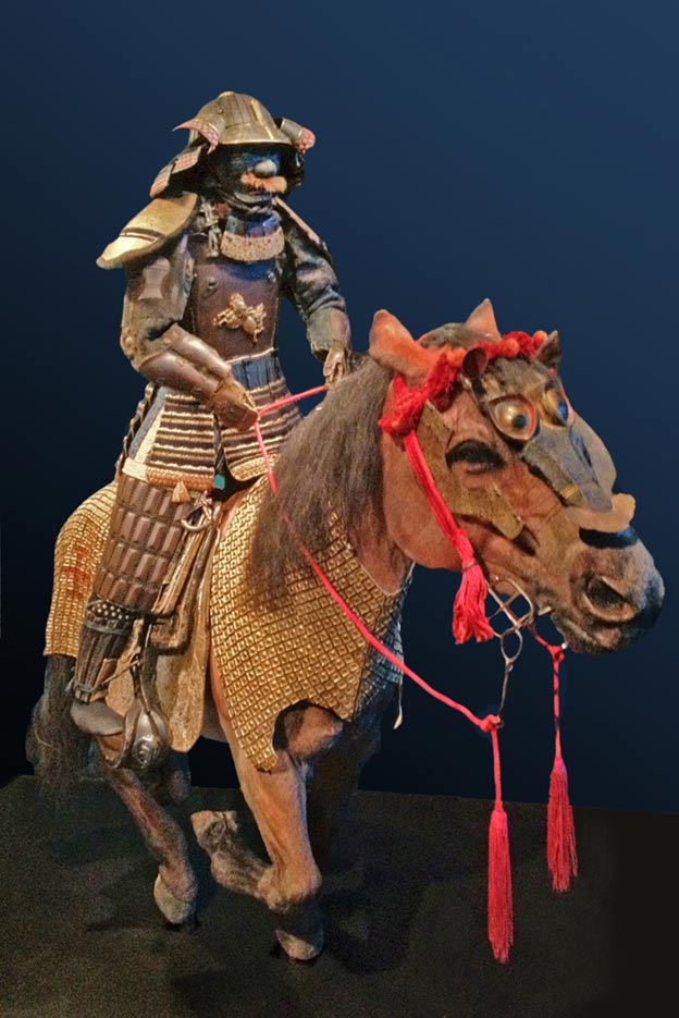 The armor of the Samurai is dated to the Edo era, the seventeenth century. 